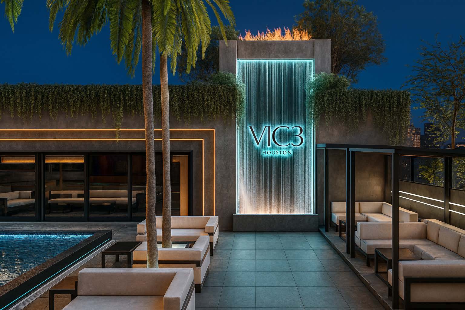 VIC3 rooftop waterfall feature wall with fire, pool, and lounge seating